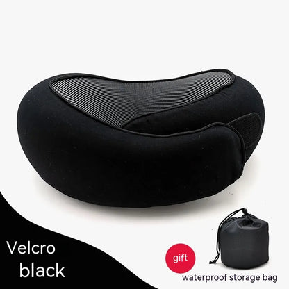 Black travel pillow with a small black storage bag on a white background