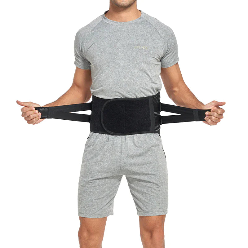 Person wearing a black waist support belt on a white background